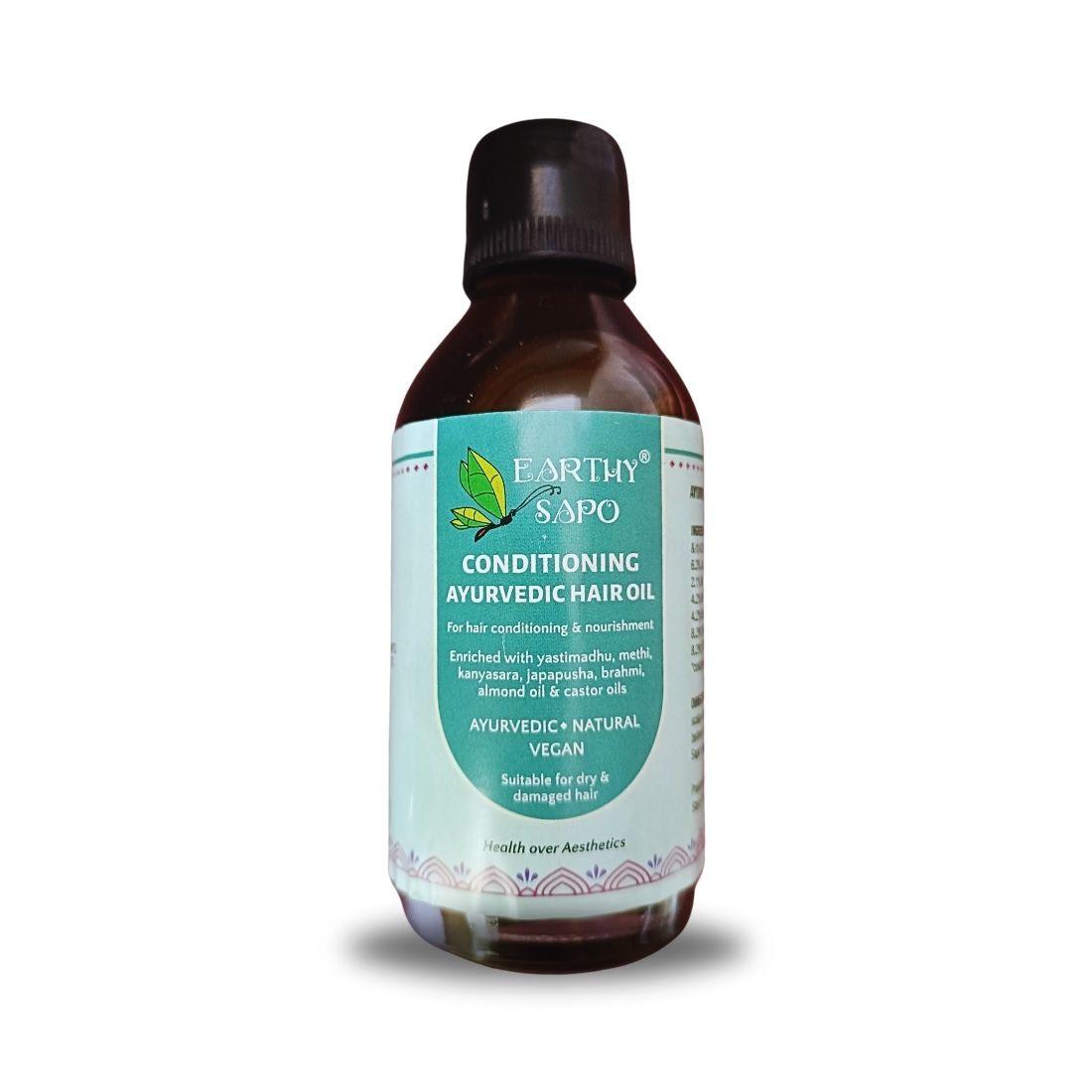Earthy Sapo Conditioning Ayurvedic Hair Oil for dry and damaged hair, enriched with yastimadhu, hibiscus, brahmi, methi and cold-pressed oils