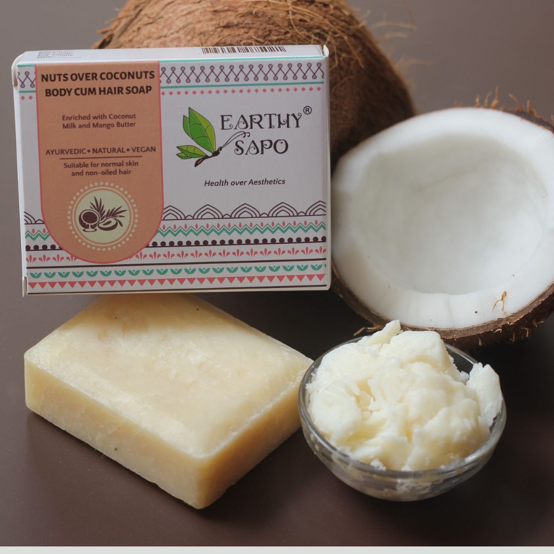 Earthy Sapo Nuts Over Coconuts Body & Hair Soap with coconut milk and mango butter for gentle cleansing and moisturization.