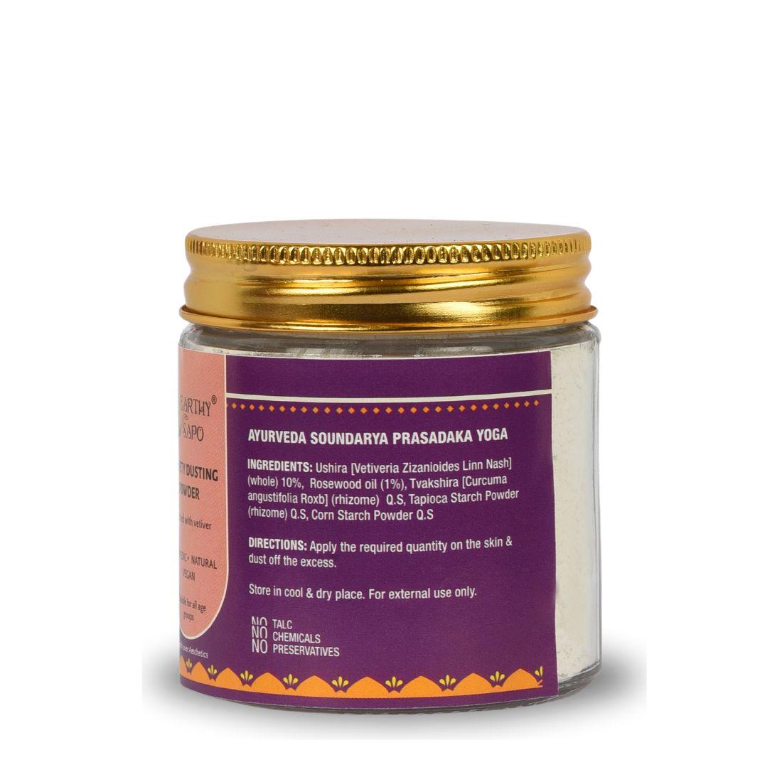 Earthy Sapo Velvety Dusting Powder in a glass jar with a gold lid.