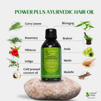 Earthy Sapo Power Plus Ayurvedic Hair Oil with Bhringraj, Brahmi, Amla, Rosemary, Hibiscus, Methi and cold-pressed coconut oil.