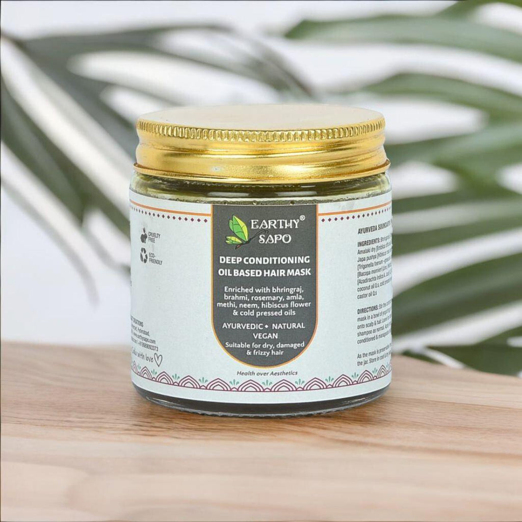 Earthy Sapo Deep Conditioning Oil Based Hair Mask in a jar, enriched with Ayurvedic herbs and cold-pressed oils for dry, frizzy and damaged hair