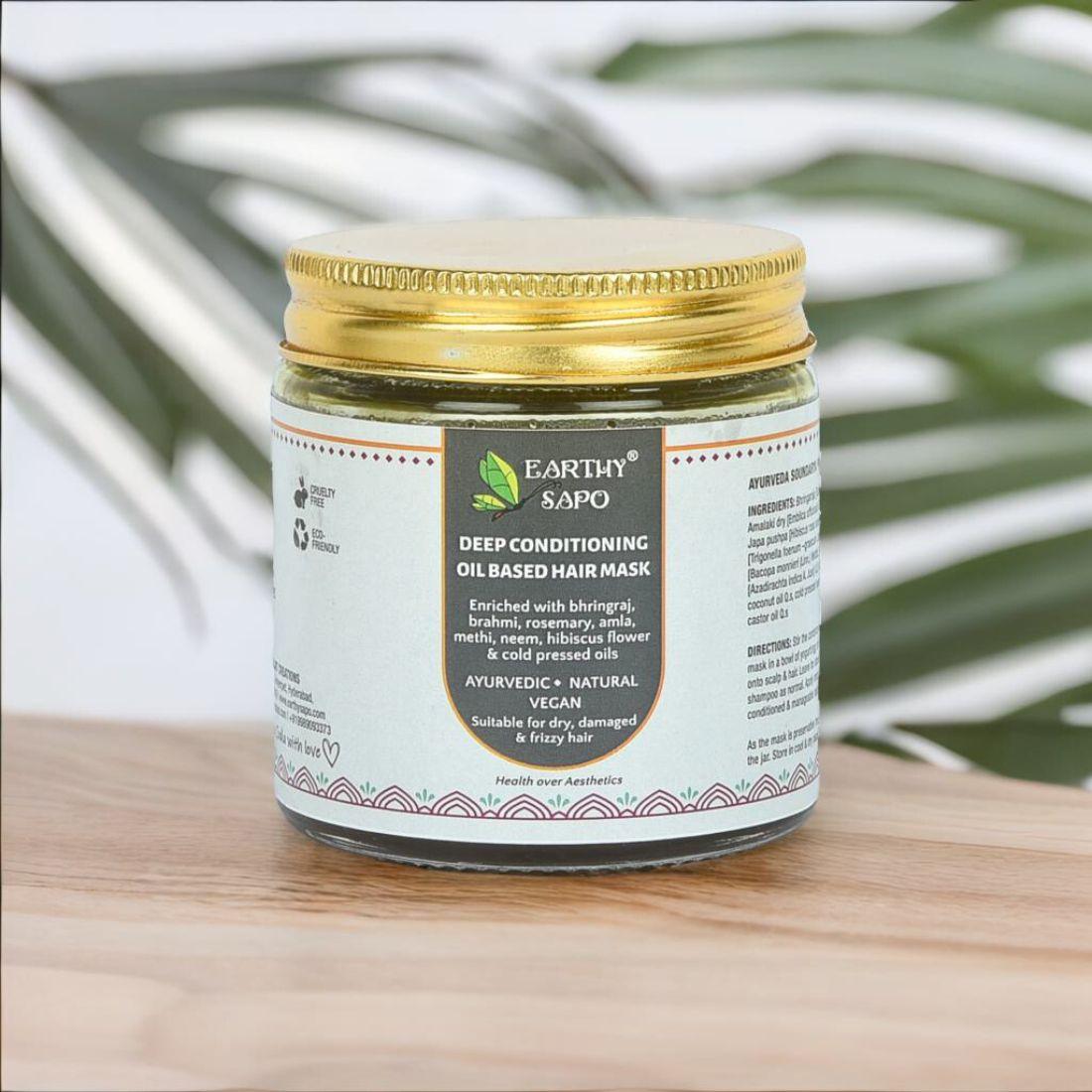 Earthy Sapo Deep Conditioning Oil Based Hair Mask in a jar, enriched with Ayurvedic herbs and cold-pressed oils for dry, frizzy and damaged hair