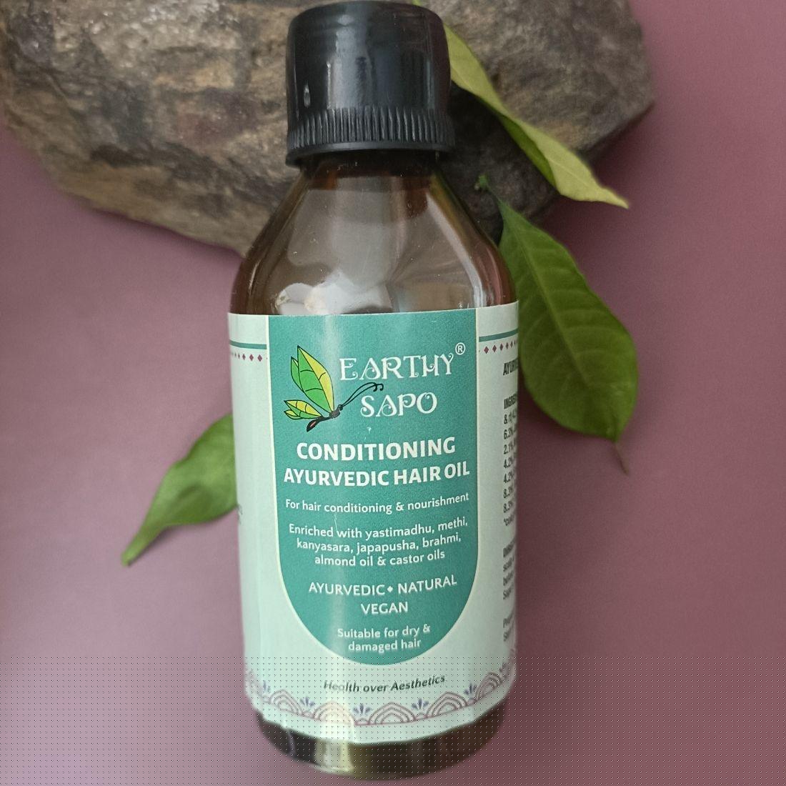 Earthy Sapo Conditioning Ayurvedic Hair Oil for dry and damaged hair, enriched with yastimadhu, hibiscus, brahmi, methi and cold-pressed oils