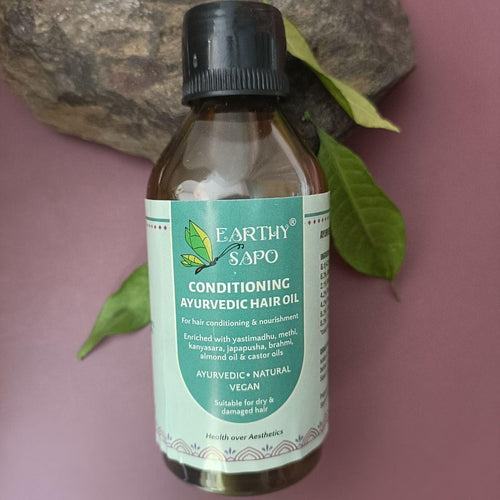 Earthy Sapo Conditioning Ayurvedic Hair Oil for dry and damaged hair, enriched with yastimadhu, hibiscus, brahmi, methi and cold-pressed oils
