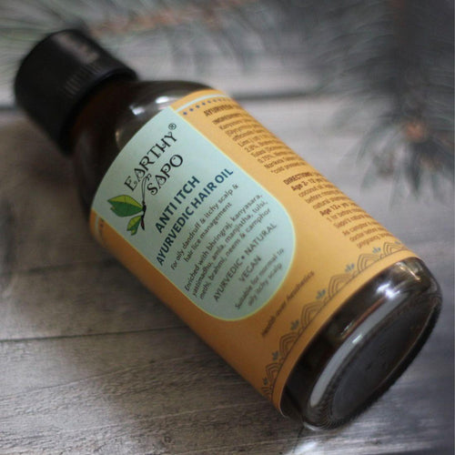 Earthy Sapo Anti-Itch Ayurvedic Hair Oil with bhringraj, amla, brahmi, neem, tulasi and cold-pressed coconut oil for itchy scalp care