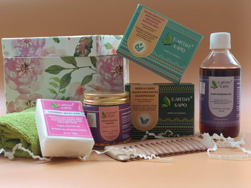 Earthy Sapo Baby Care Hamper for 0–12 months with Baby Massage Oil, unscented bathing soap, shampoo bar, dusting powder, laundry bar, comb and hand towel