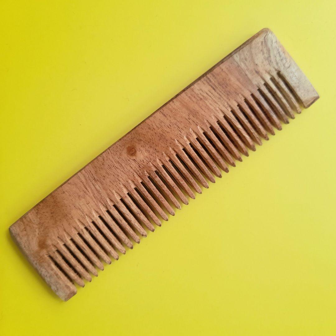 Earthy Sapo Pocket Neem Comb made from natural neem wood for gentle, eco-friendly hair and scalp care.