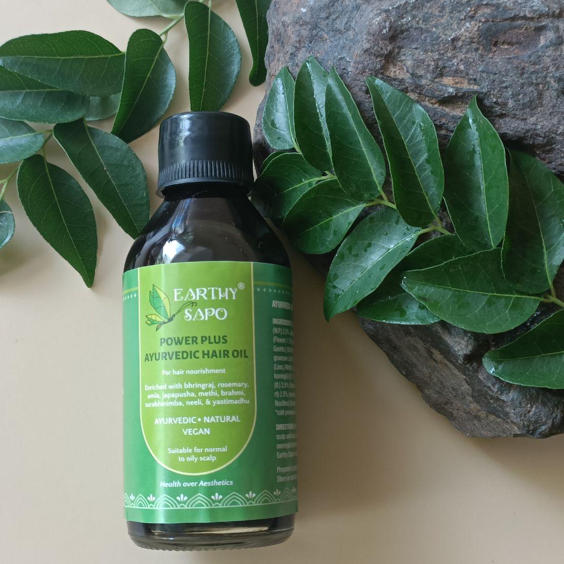 Earthy Sapo Power Plus Ayurvedic Hair Oil with Bhringraj, Rosemary, Amla and other Ayurvedic herbs for hair nourishment.