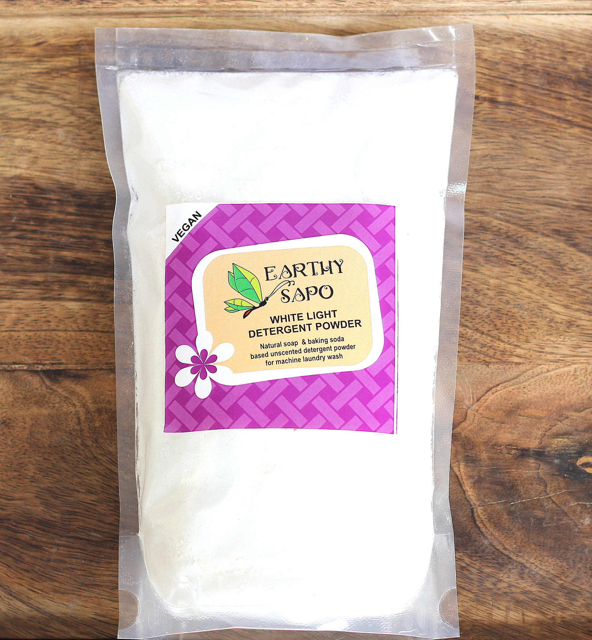 Earthy Sapo White Light Detergent Powder in a resealable pouch for natural and unscented laundry care.